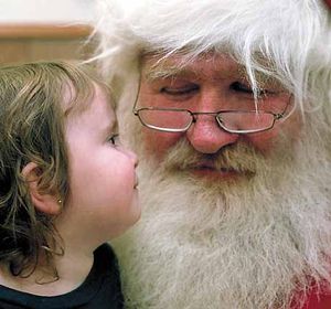 Santa Claus with a little girl